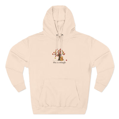 Capy Life beige fleece hoodie featuring a graphic of a capybara under an autumn tree with the text this is enough.