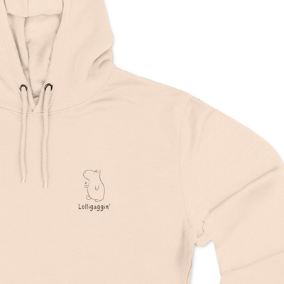 Capy Life cream-colored premium fleece hoodie featuring a small, minimalist embroidered capybara and the text Lolligaggin