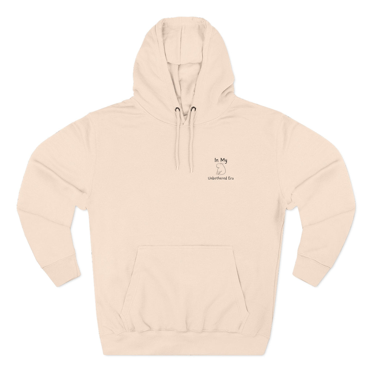 Capy Life premium beige hoodie featuring a minimalist embroidered capybara and the text In My Unbothered Era.