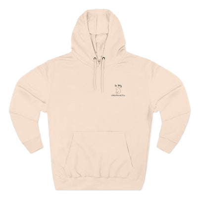 Capy Life premium beige hoodie featuring a minimalist embroidered capybara and the text In My Unbothered Era.