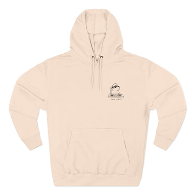 Capy Life beige fleece hoodie featuring a minimalist embroidered capybara DJ design with the text Just Vibin