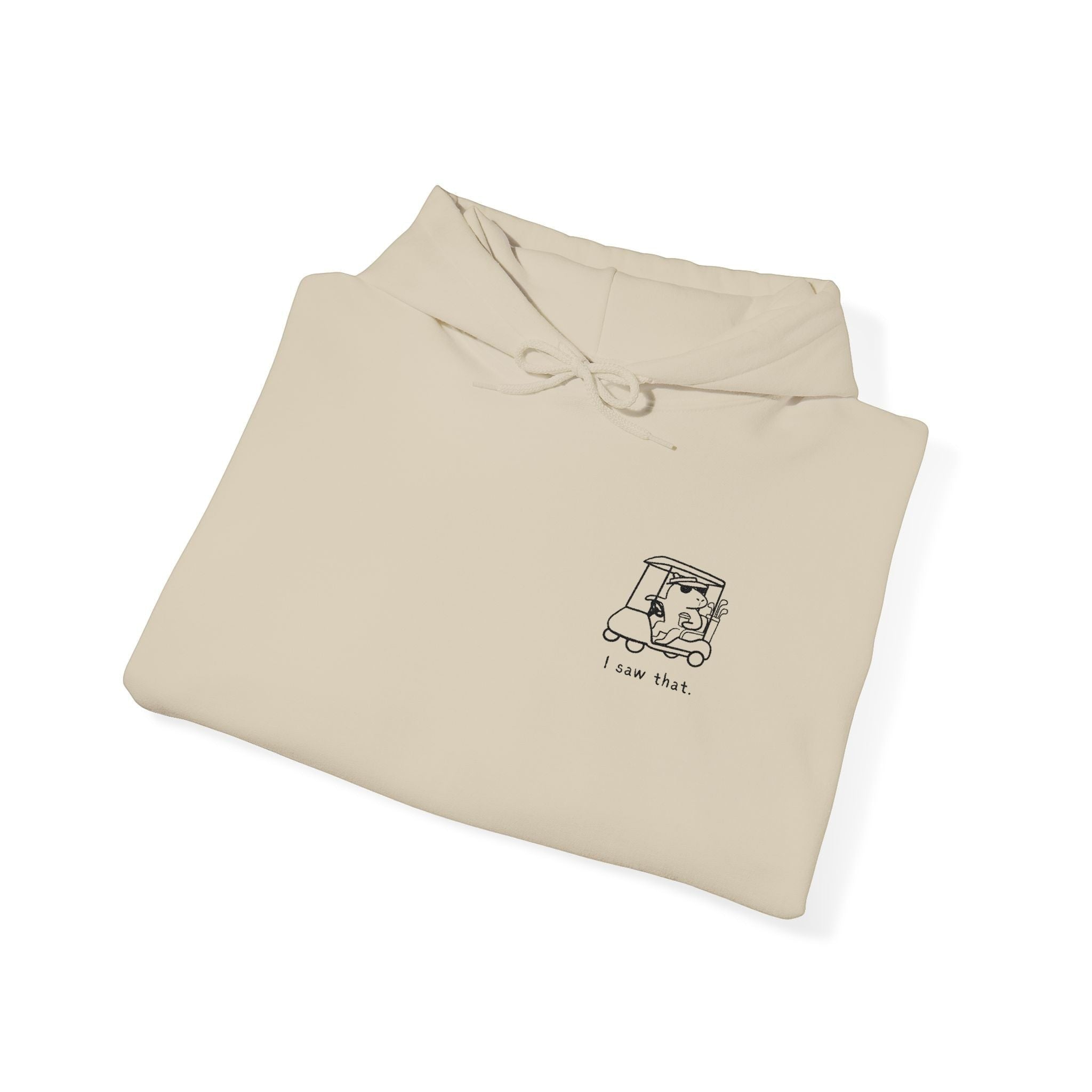 Capy Life beige minimalist golf hoodie featuring a small embroidered capybara in a golf cart with I saw that text.