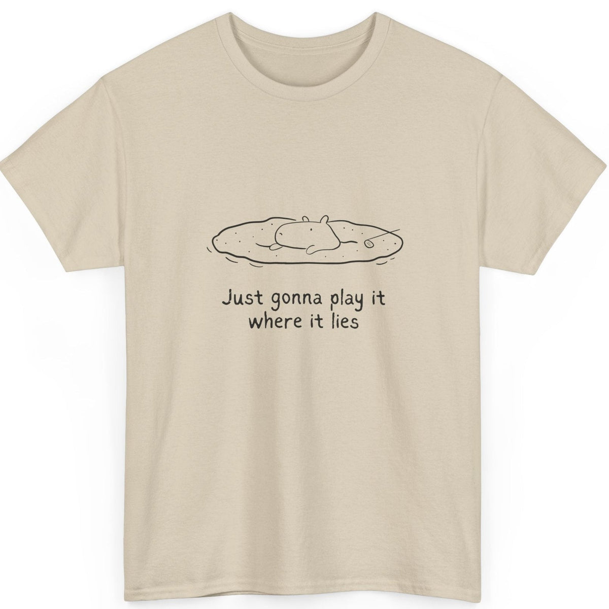 Capy Life beige heavy cotton t-shirt featuring a line art illustration of a capybara golfing with funny text.