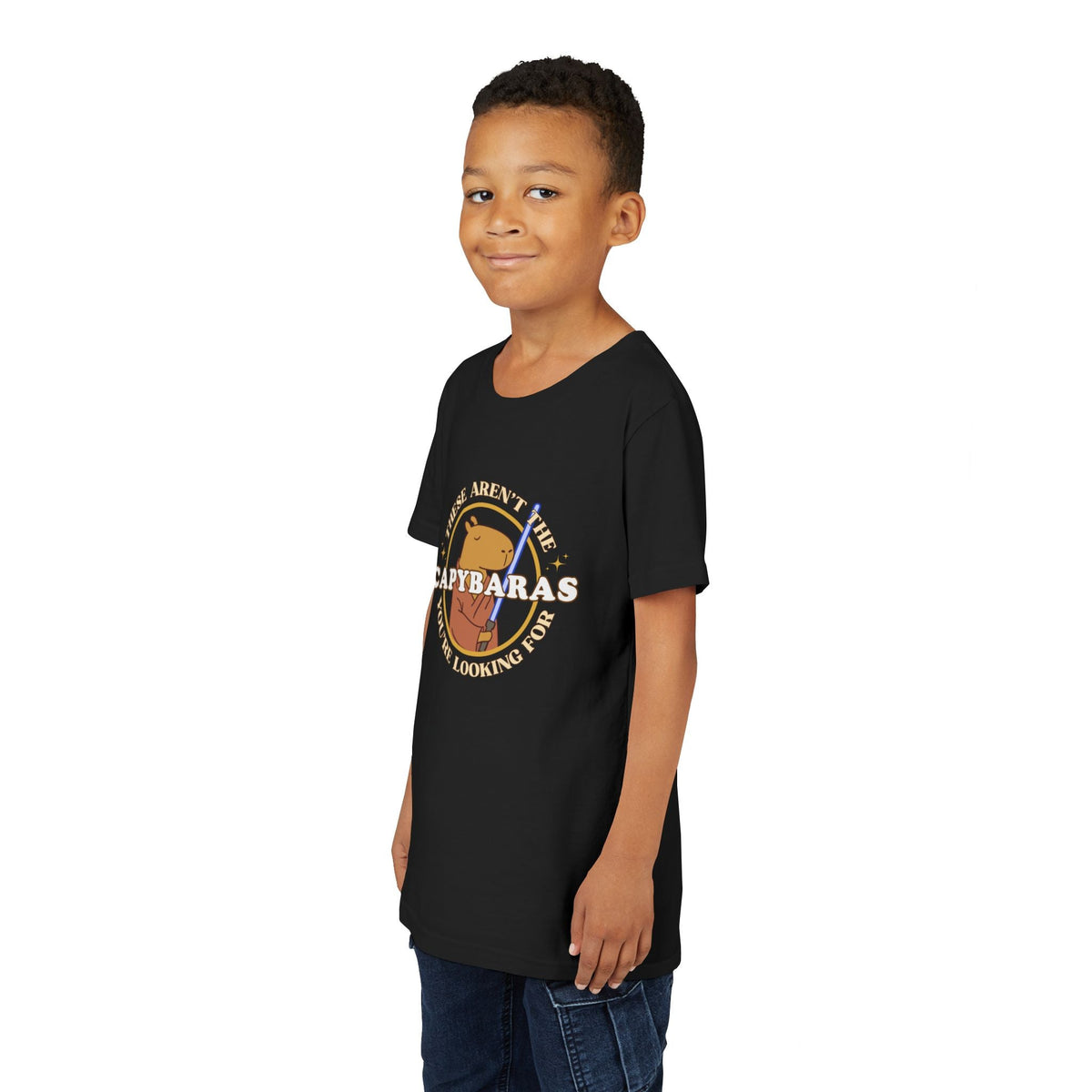 Capy Life youth black t-shirt featuring a comic-style Jedi capybara graphic with Star Wars parody text
