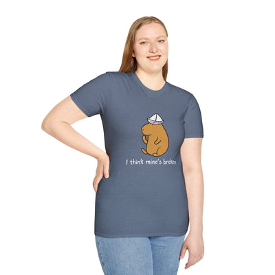 A woman wearing a Capy Life blue softstyle t-shirt featuring a capybara in a paper thinking cap with funny text.