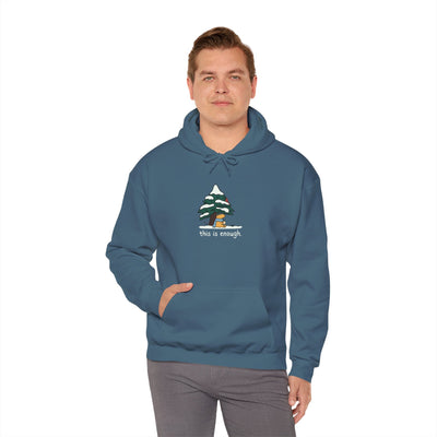 Capy Life blue pullover hoodie featuring a graphic of a capybara under a snowy tree with the text this is enough.
