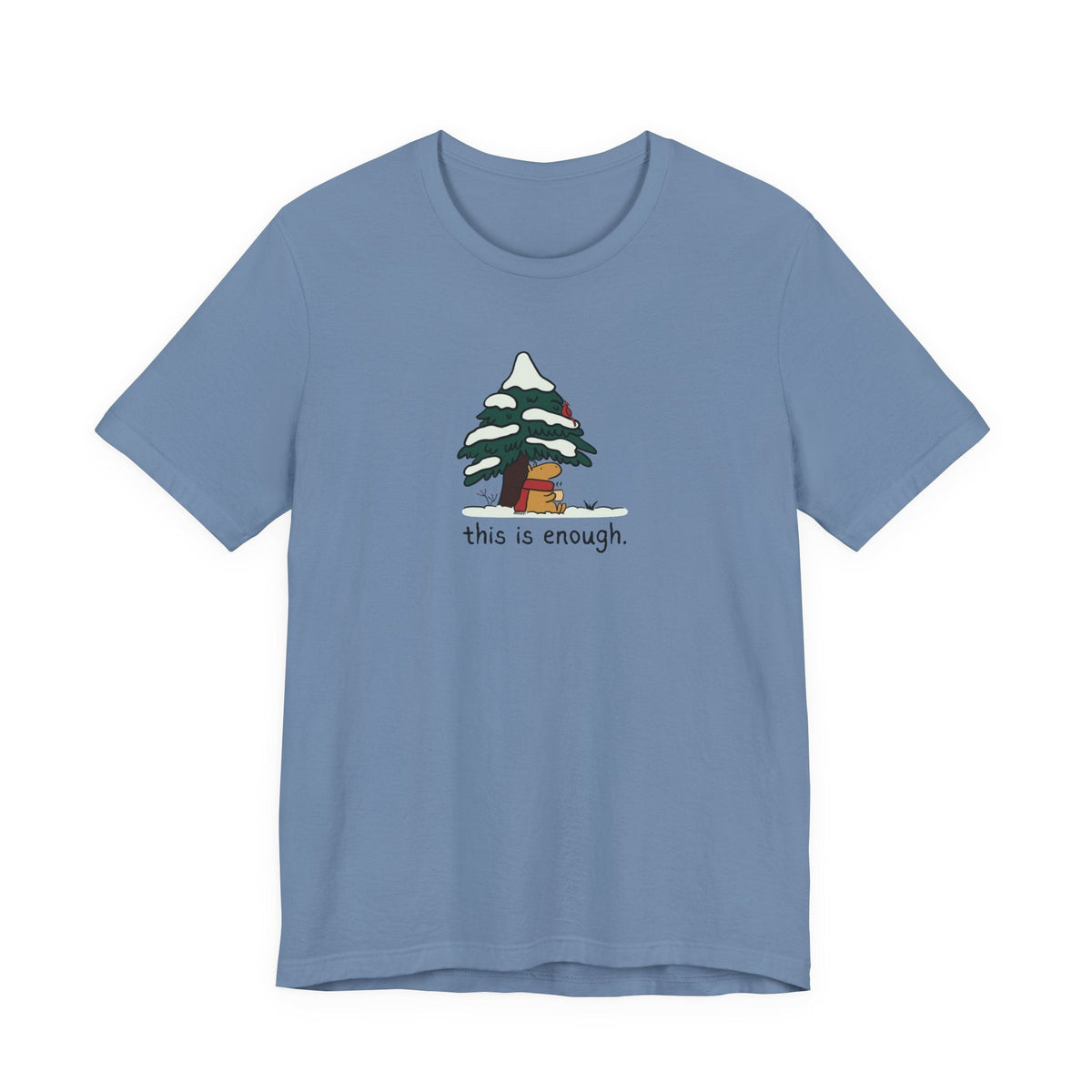 Capy Life blue graphic t-shirt featuring a cute capybara in a scarf sitting under a snowy evergreen tree.