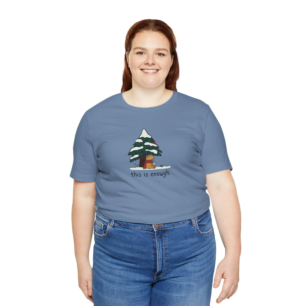Capy Life blue short-sleeve graphic tee featuring a capybara under a snowy evergreen tree with the text this is enough