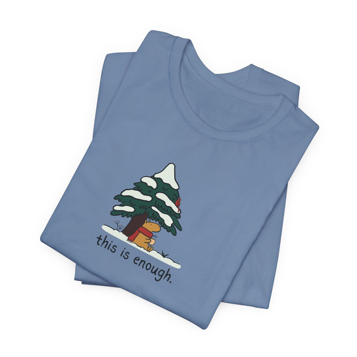 Capy Life blue graphic t-shirt featuring a hand-drawn capybara in a scarf under a snowy tree with this is enough text