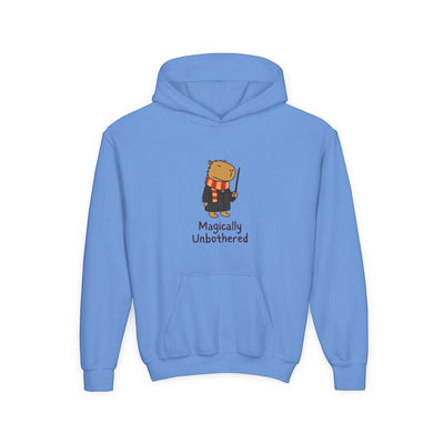 Capy Life kids blue hoodie featuring a cute capybara wizard illustration with the text Magically Unbothered
