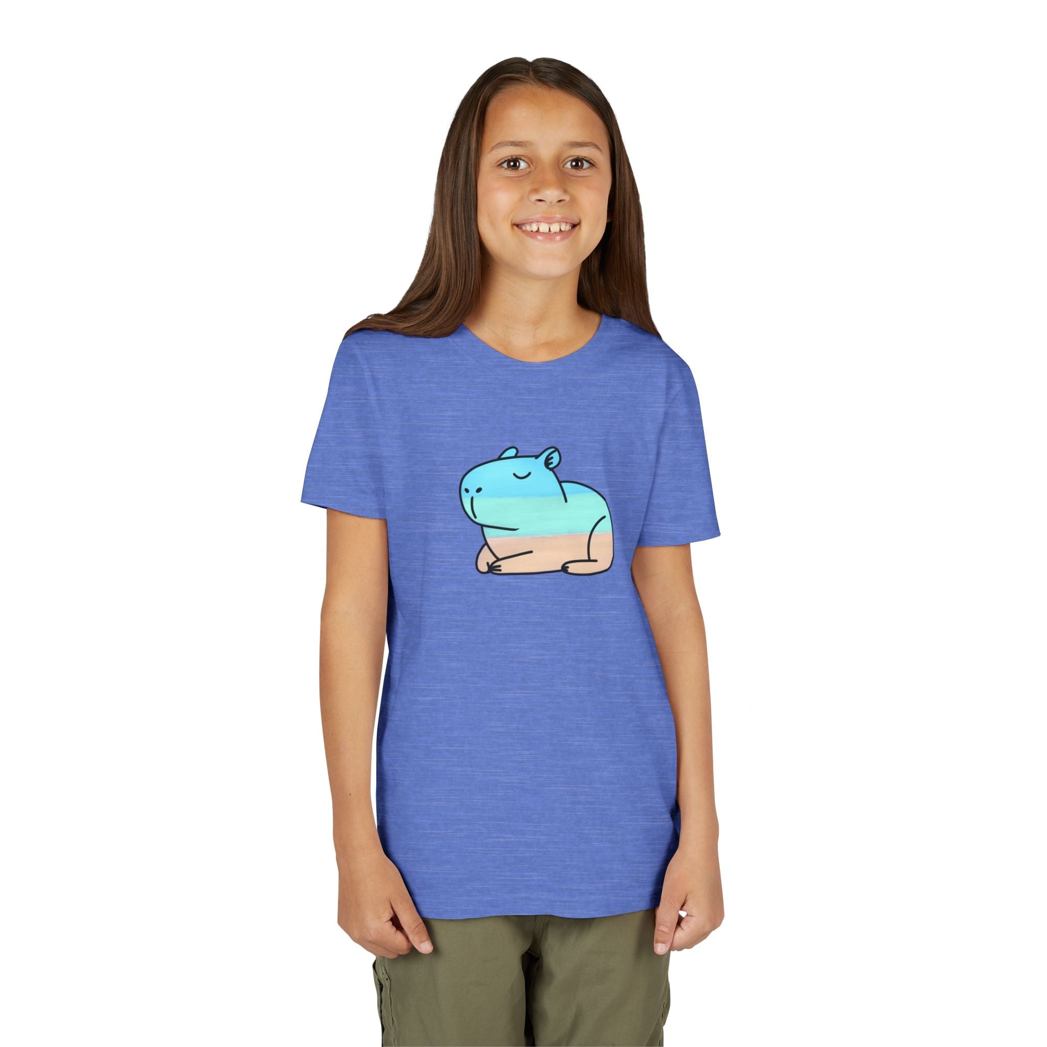 Capy Life youth t-shirt in heather blue with a hand-painted coastal capybara graphic on the front worn by a girl