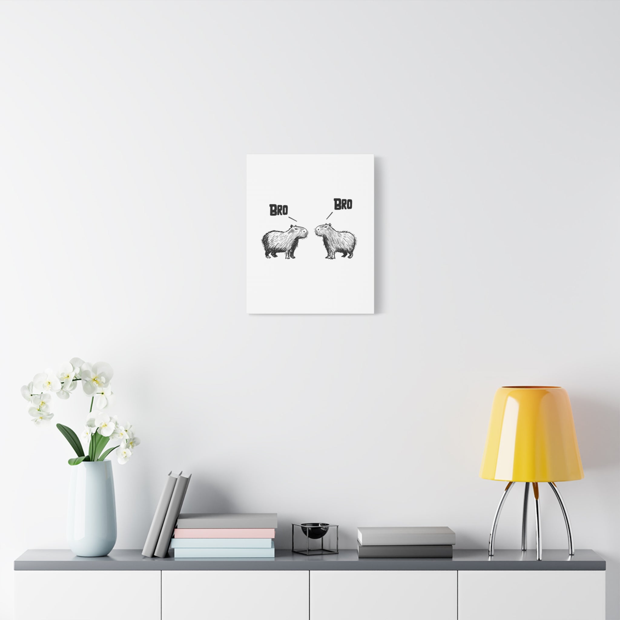 Capy Life Bro Bro canvas wall art featuring two hand-drawn capybaras facing each other on a white wall.