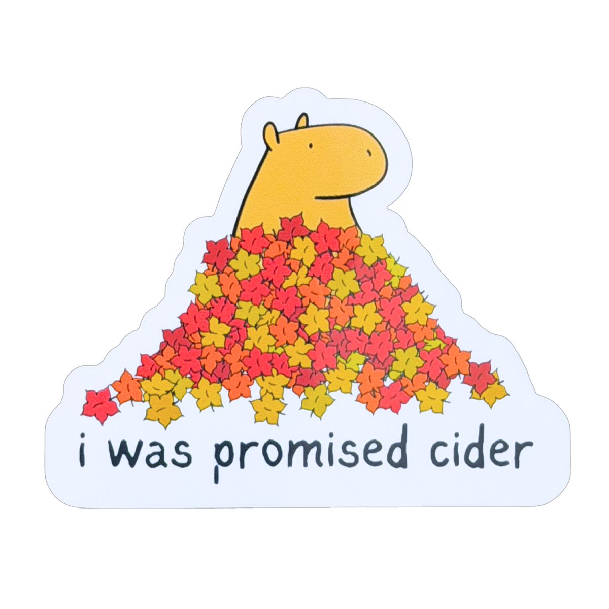 Capy Life die-cut sticker featuring a capybara in a pile of autumn leaves with the text I was promised cider