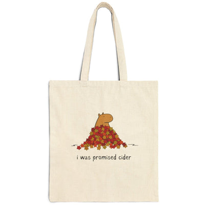Capy Life natural canvas tote bag featuring a capybara in autumn leaves with the text I was promised cider