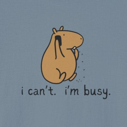 Capy Life softstyle t-shirt in blue featuring a minimalist illustration of a capybara snacking with the text I can't I'm busy