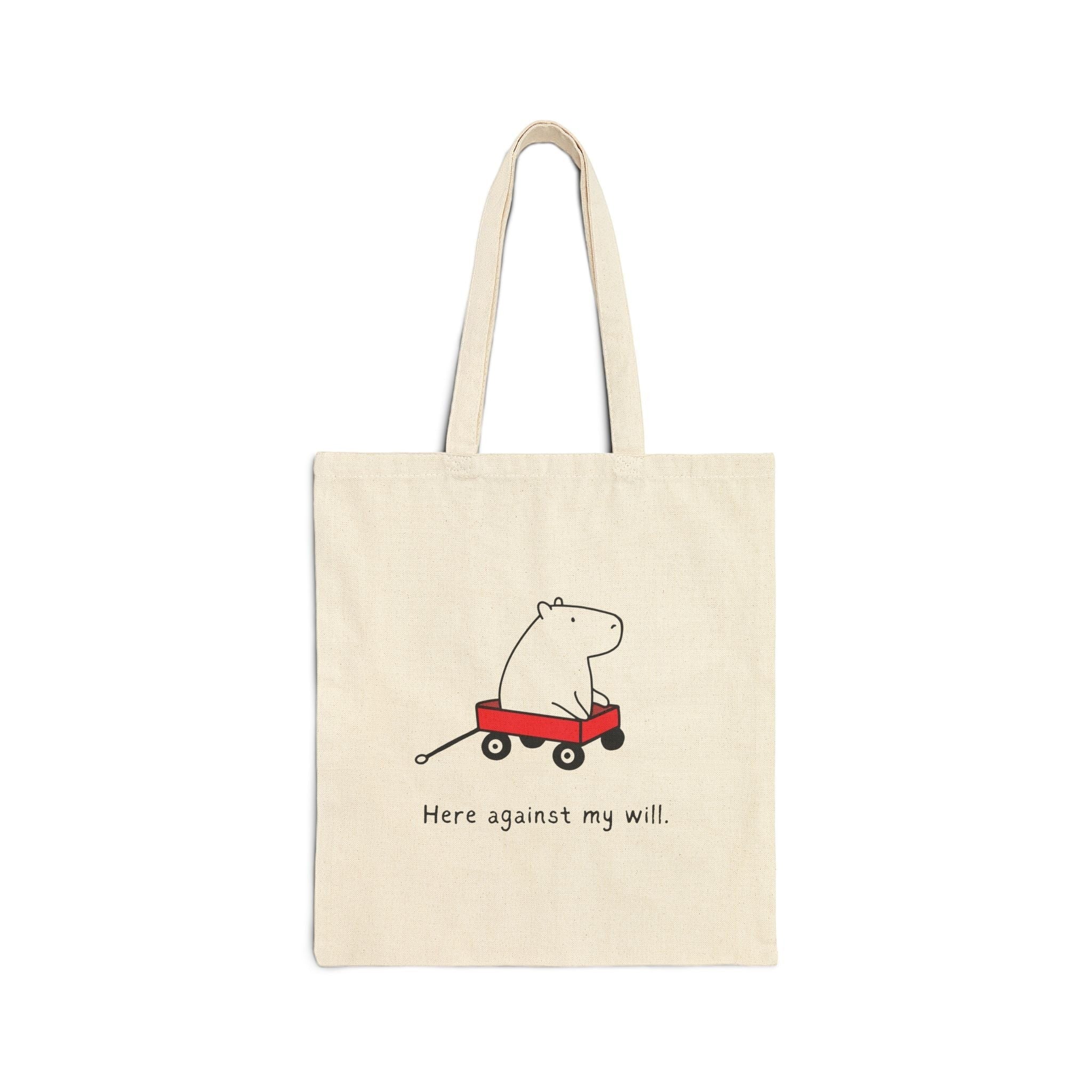 Capy Life natural canvas tote bag featuring a minimalist illustration of a capybara in a red wagon with funny text.