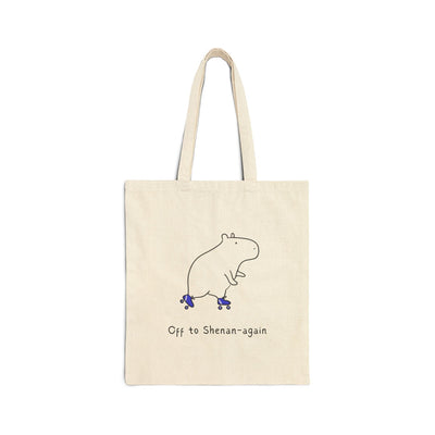 Capy Life natural cotton canvas tote bag featuring a minimalist illustration of a capybara on blue roller skates.