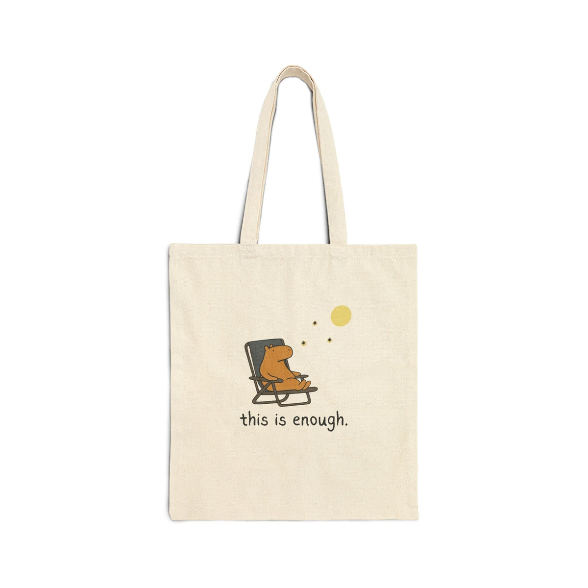 Capy Life natural canvas tote bag featuring a hand-drawn capybara relaxing in a chair under a moon with text.