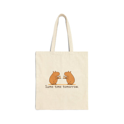 Capy Life natural cotton canvas tote bag featuring a hand-drawn illustration of two capybaras sharing coffee.