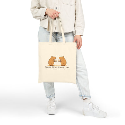 Capy Life natural cotton canvas tote bag featuring a hand-drawn illustration of two capybaras sharing coffee.