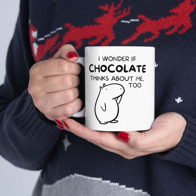 Capy Life white ceramic mug featuring a hand-drawn capybara and the text I wonder if chocolate thinks about me too