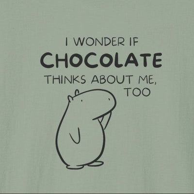Capy Life sage green softstyle t-shirt featuring Gene the Capybara line art and the text I wonder if chocolate thinks about me too