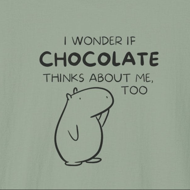 Capy Life sage green softstyle t-shirt featuring Gene the Capybara line art and the text I wonder if chocolate thinks about me too