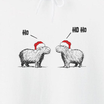 Capy Life white hoodie featuring a sketch of two capybaras in red Santa hats saying Ho and Ho Ho for Christmas