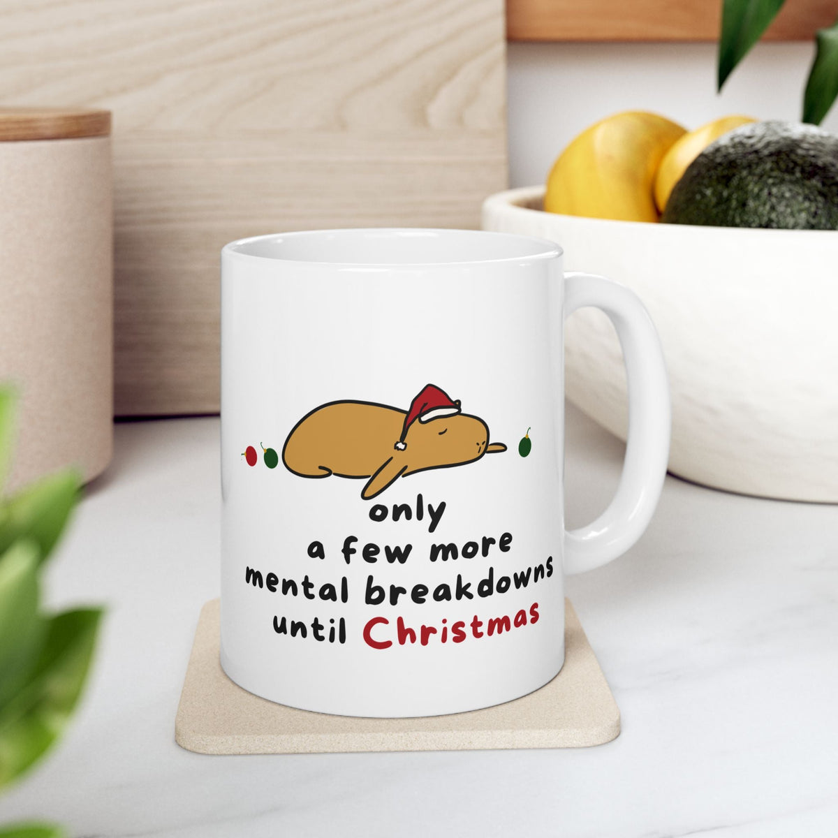 Capy Life white ceramic mug featuring a flat-lying capybara in a Santa hat with funny Christmas text.