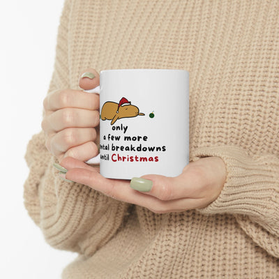Capy Life white ceramic mug featuring a capybara in a Santa hat with the text Only a few more mental breakdowns until Christmas.