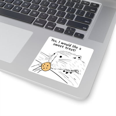 Capy Life sticker on a laptop featuring a hand-drawn capybara holding a cookie with the text Yes I would like a sweet treat