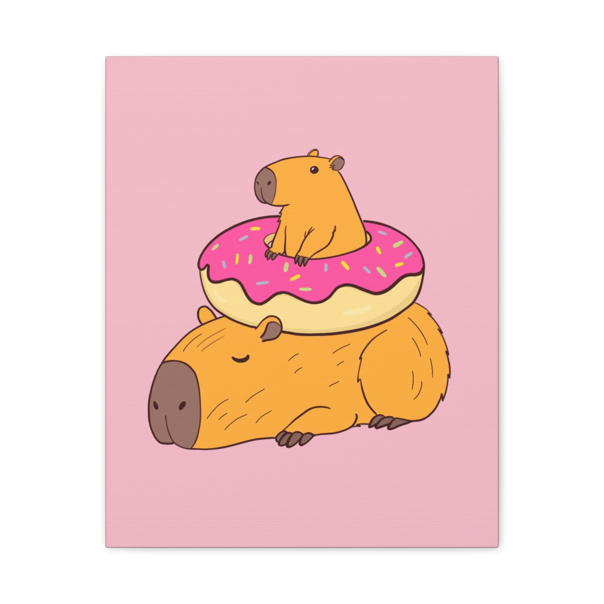 Capy Life canvas wall art featuring a relaxed capybara with a smaller capybara sitting in a pink frosted donut on top.