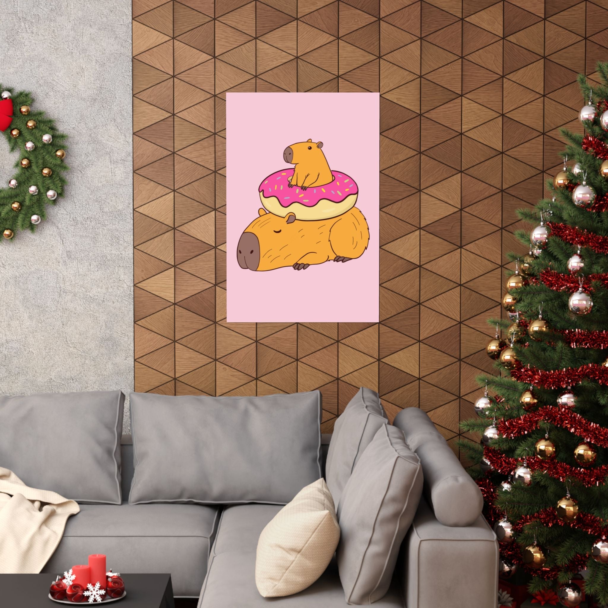 Capy Life wall art print featuring a cute capybara on a donut, displayed in a cozy living room with holiday decor.