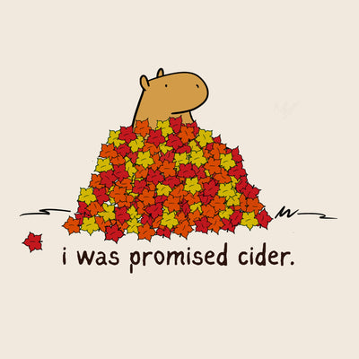 Capy Life hoodie graphic featuring a capybara in a pile of red and yellow autumn leaves with text I was promised cider