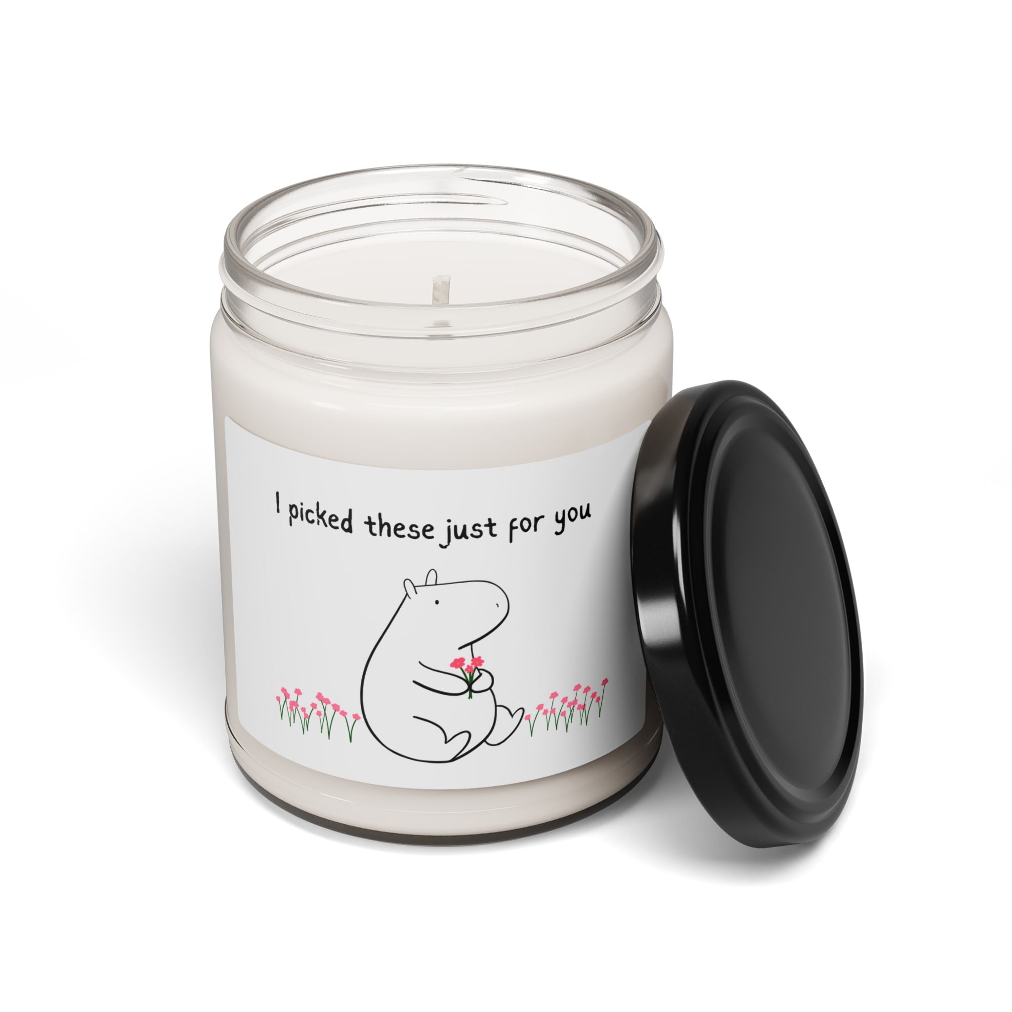 Capy Life soy wax candle in a glass jar with a cute capybara illustration and the text I picked these just for you