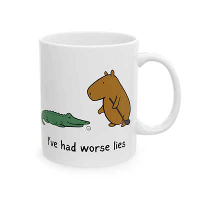 Capy Life white ceramic coffee mug featuring a capybara and alligator with the text I've had worse lies