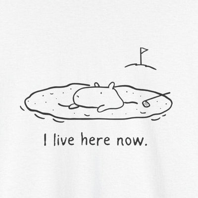 Capy Life white t-shirt featuring a minimalist line drawing of a capybara relaxing in a golf sand bunker.