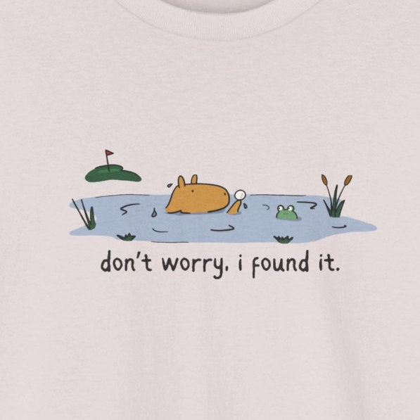 Capy Life heavy cotton t-shirt with a capybara in a water hazard, golf flag, and text don't worry, i found it.
