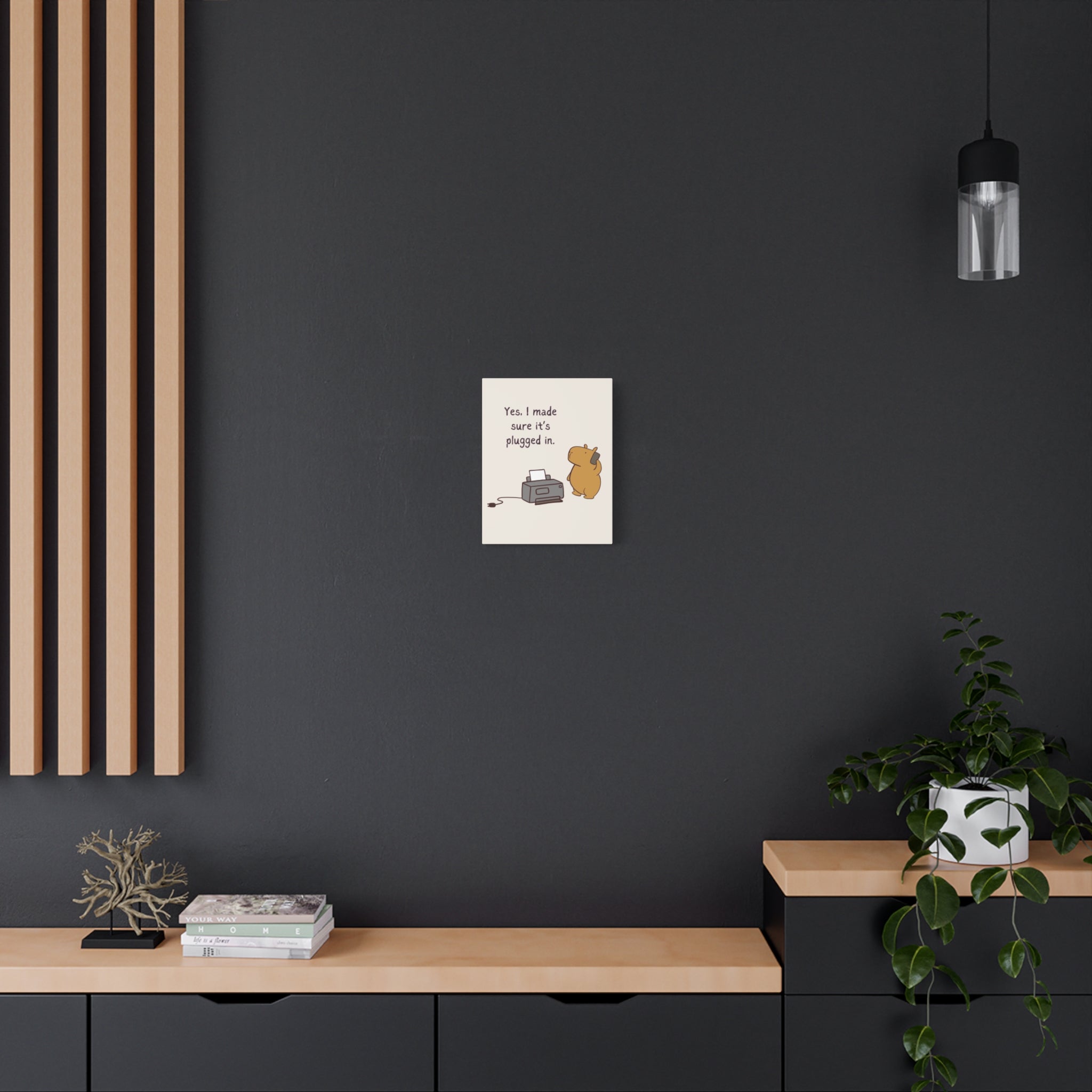 Capy Life canvas wall art featuring a funny capybara IT humor illustration hanging on a dark grey office wall.