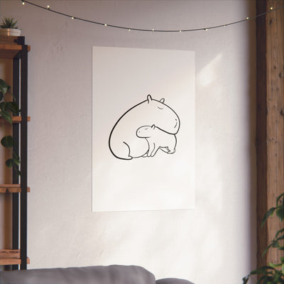 Capy Life minimalist wall art featuring a black line drawing of a parent and baby capybara on a white background.