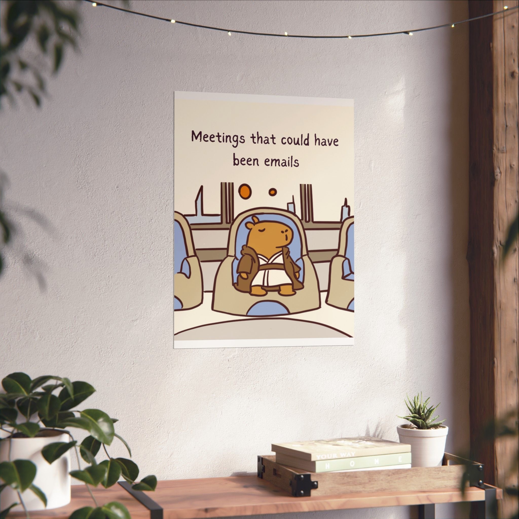Capy Life wall art print featuring a Jedi capybara in a meeting, displayed on a white wall above a wooden desk.