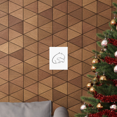 Capy Life minimalist line art print of a mama and baby capybara hanging on a wooden geometric wall near a tree