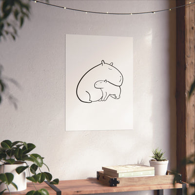 Capy Life minimalist wall art featuring a black line drawing of a parent and baby capybara on a white background.