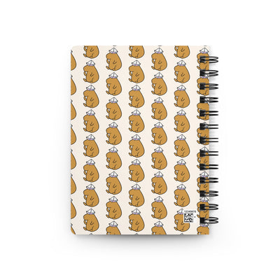Capy Life spiral-bound notebook featuring a repeating pattern of cute capybaras wearing paper hats on a neutral background
