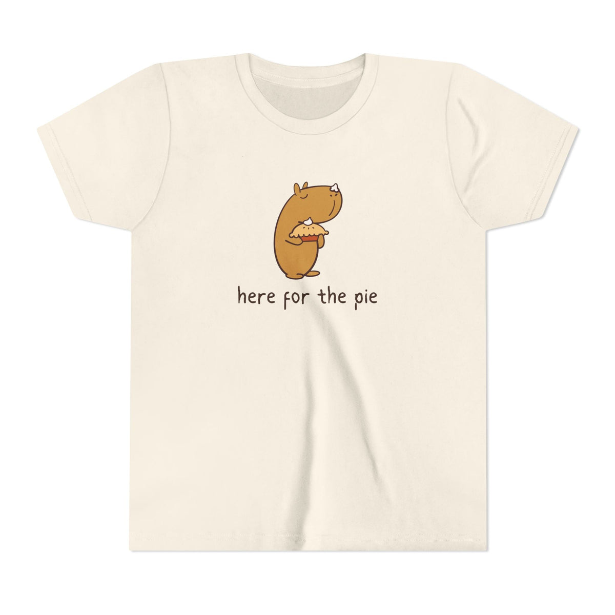 Capy Life kids t-shirt in cream featuring a cute capybara holding a pie with whipped cream on its nose.