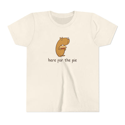 Capy Life kids t-shirt in cream featuring a cute capybara holding a pie with whipped cream on its nose.