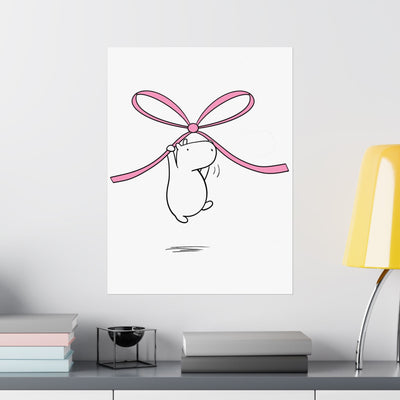 Capy Life minimalist wall art print featuring a cute capybara hanging from a large pink bow on a white background.