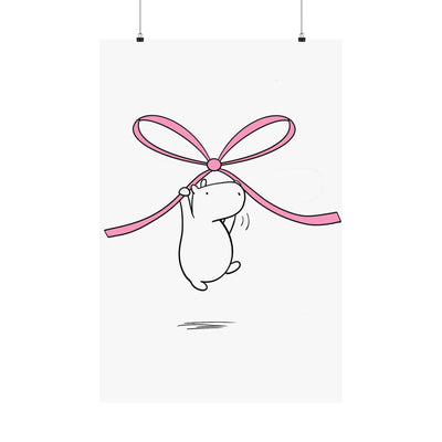 Capy Life minimalist nursery wall art print featuring a cute white capybara floating while holding a large pink bow.