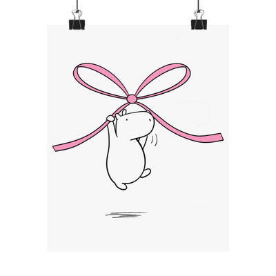 Capy Life minimalist wall art print featuring a cute white capybara floating while holding a large pink bow.