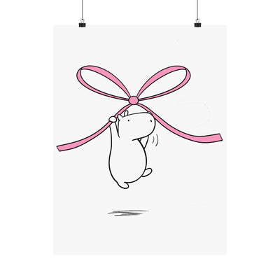 Capy Life nursery wall art print featuring a minimalist hand-drawn capybara floating while holding a large pink bow.